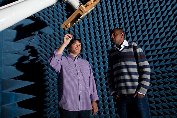 Christopher Thajudeen works with another student in a Villanova engineering lab.