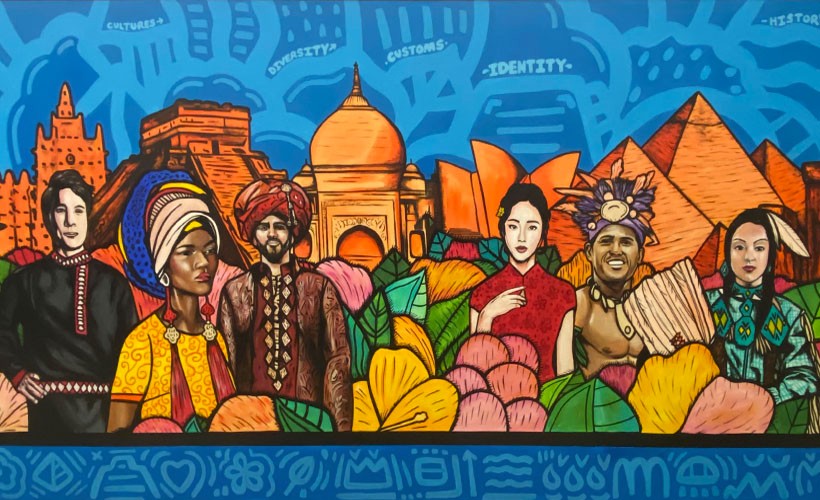 Mural painted by Alloyius Mcilwaine outside of the GIS office in Garey Hall.