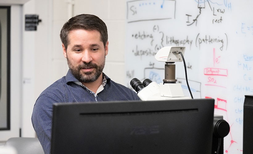 Professor viewing monitor Professor viewing monitor